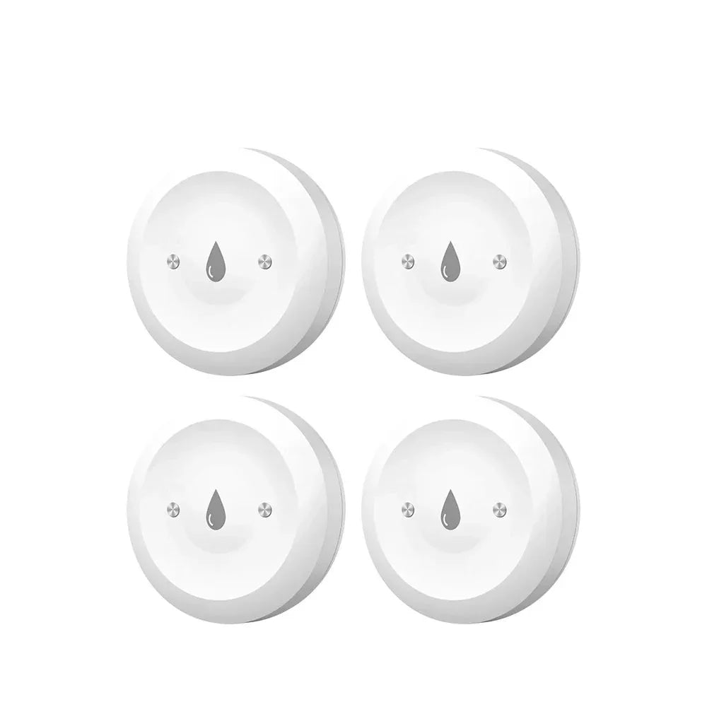 Four white water leak detectors with drop icon, smart home safety sensors